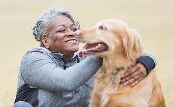 Woman happy with pet dog